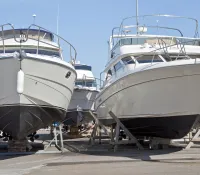 a group of boats parked on the dock