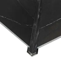 Close-up of black tile corner with metal edge trim protecting the tile edges for durability and finish.
