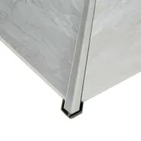 Close-up of a gray tile corner featuring a metal trim edge for protection and a polished finish.