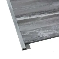 Gray marble tile with metal edge trim on a white background, showing corner detail and texture.