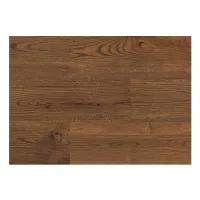 Close-up of brown wood flooring with visible grain patterns and knots in a natural finish.