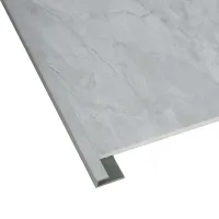 Close-up of a gray marble-textured tile with a metal T-shaped edge trim for flooring or wall installation.