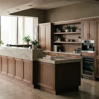 Modern kitchen with wooden cabinetry, marble countertops, built-in oven, wine fridge, and decorative plants.