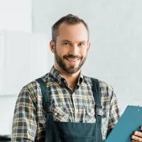 a person standing in a kitchen