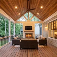 Side-by-side comparison of a rustic screened porch before and after renovation with new furniture and lighting.
