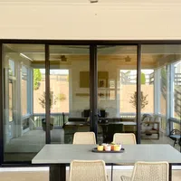 a room with a table and chairs