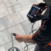 a person holding a device