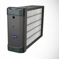 Carrier air purifier device with a sleek dark gray design and white filter panel on the side