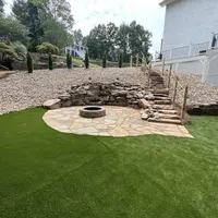 a small stone structure in a yard