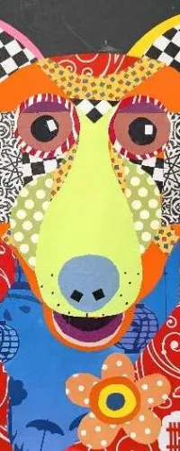 Colorful patchwork dog portrait with bold patterns, bright colors, and a flower on a dark background.