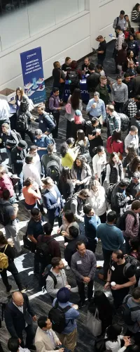 a large group of people in a hall