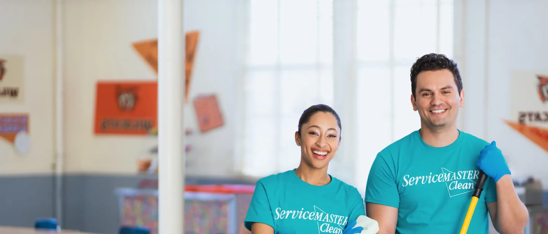 a man and a woman holding a plate of food
