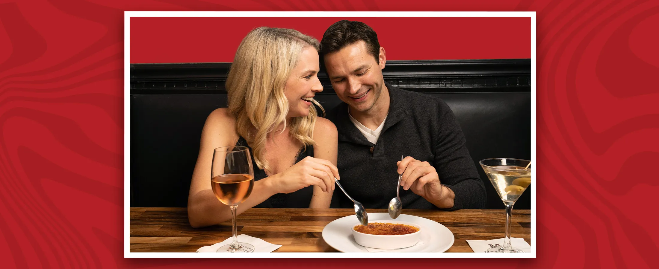 a man and a woman eating at a table