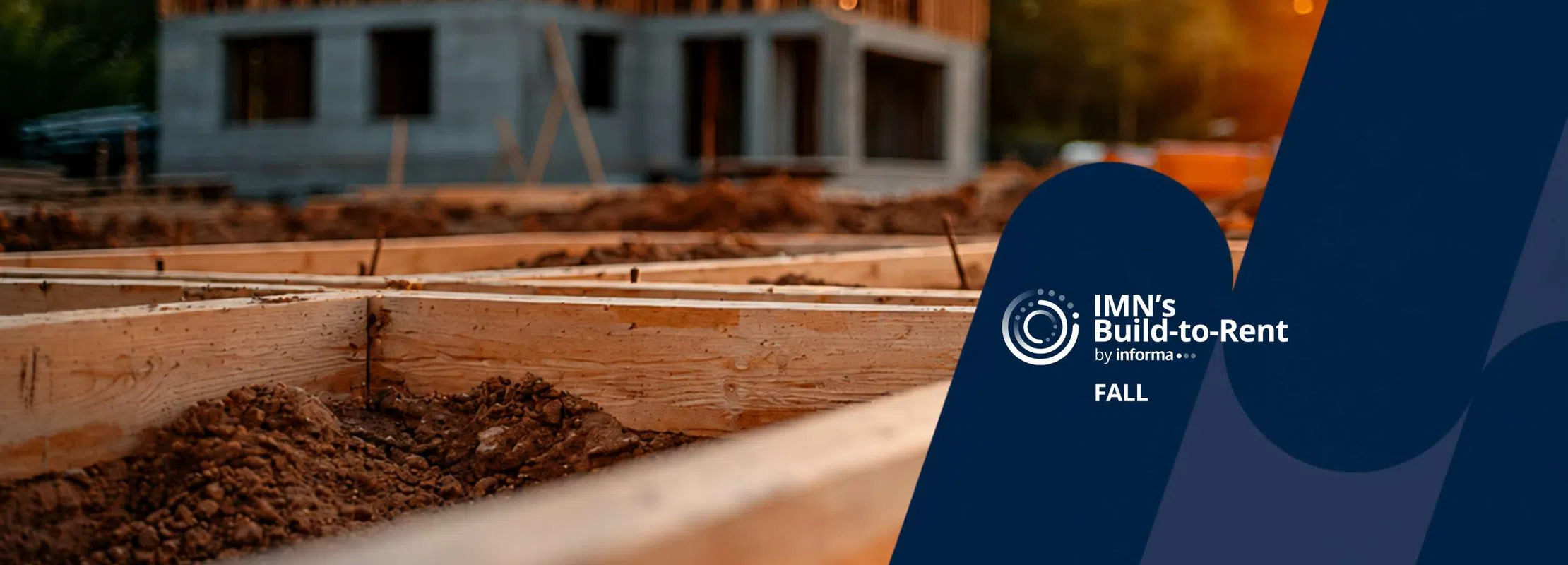 Construction site with wooden framework and partially built house during sunset, featuring IMN Build-to-Rent branding.