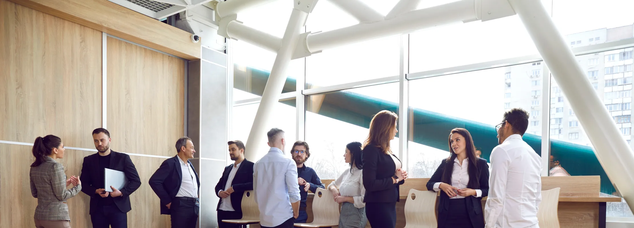 a group of people standing in a room