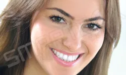 Thumbnail control image for a woman smiling for the camera