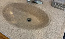 Thumbnail control image for dirty bathroom sink and counter cleaned by MaidPro Salem