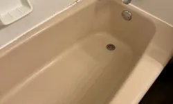 Thumbnail control image for Beige bathtub cleaned by MaidPro Salem to remove all dirt, grime and calcium buildup