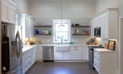 Thumbnail control image for a white refrigerator freezer sitting inside of a kitchen