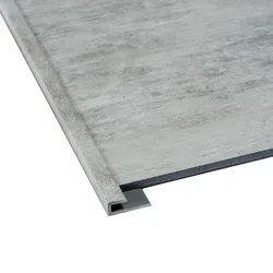 Close-up of a gray vinyl flooring plank with an L-shaped metal edge trim isolated on white.