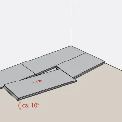 Illustration of flooring panels being installed with one panel tilted at approximately 10 degrees for fitting.