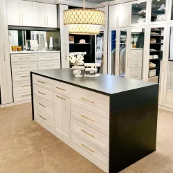 a kitchen with white cabinets