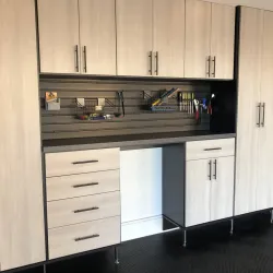 a kitchen with white cabinets