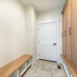 a hallway with wooden doors