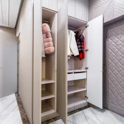 a closet with clothes