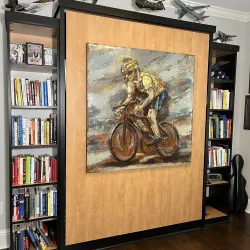 a framed painting on a wall