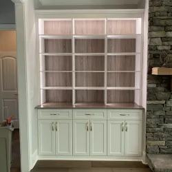 a white cabinet in a room