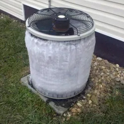 a metal cylinder on grass