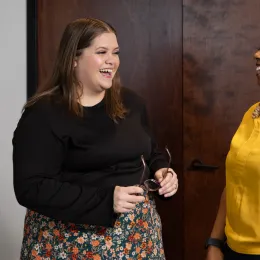 a couple of women laughing