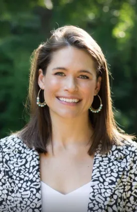 a woman smiling for the camera