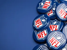 Collection of NFL logos on a blue background with a sporty theme.