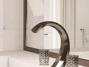 Sleek modern black faucet and textured glass handles on beige countertop with mirror and white wall background.