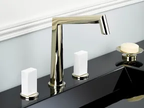 Modern black sink with a sleek silver faucet, white square handles, and soap dish on a bathroom counter.
