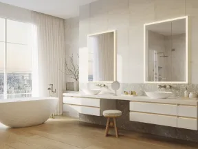 Bright modern bathroom with freestanding tub, double sinks, large mirrors, wood flooring, and city view through window.
