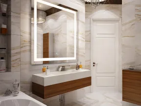 Modern bathroom with marble walls, floating wood vanity, illuminated mirror, and elegant chandelier lighting.