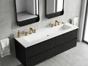 Modern black double vanity with white countertop, gold faucets, two square mirrors, and gold-accented towels in gray bathroom.