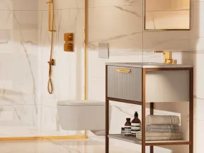Luxury bathroom with marble walls, gold fixtures, wall-mounted toilet, and modern wooden vanity with towels.