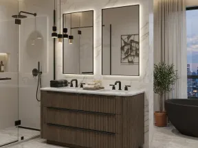 Modern bathroom with double sink vanity, backlit mirrors, glass shower, and freestanding bathtub near city view window.