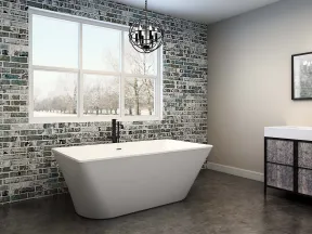 Modern bathroom with freestanding bathtub, brick accent wall, large window, and vanity with mirror.