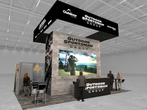 Modern Outdoor Sportsman Group trade show booth with large screen and branded displays in a spacious venue
