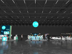Modern trade show booth with Xero branding, digital displays, seating area, and visitors in a large hall.