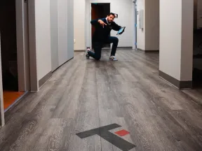 a person sitting on a floor