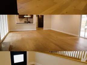 a room with a wood floor and a tv