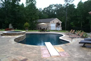 Inground Gunite Pool with spillover spa.