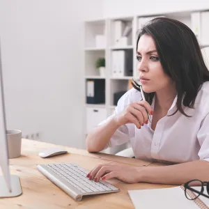 A woman reviewing a Digital Proof for a Print Project