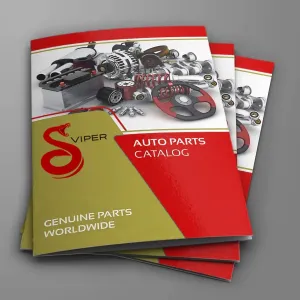 Stack of red and gold auto part catalogs with images of car parts on the cover.